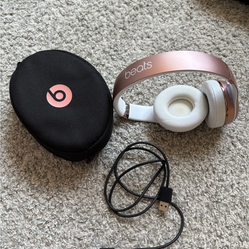 Beats rose gold headphones